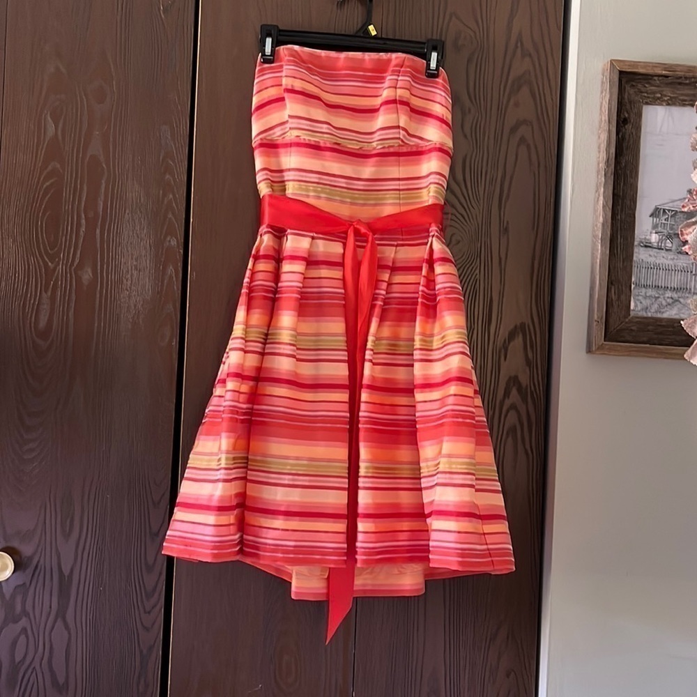 Talbot’s strapless, backless orange, cream red and green dress. Size 8